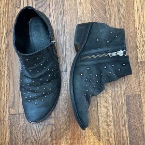 Black studded ankle booties from Urban Outfitters